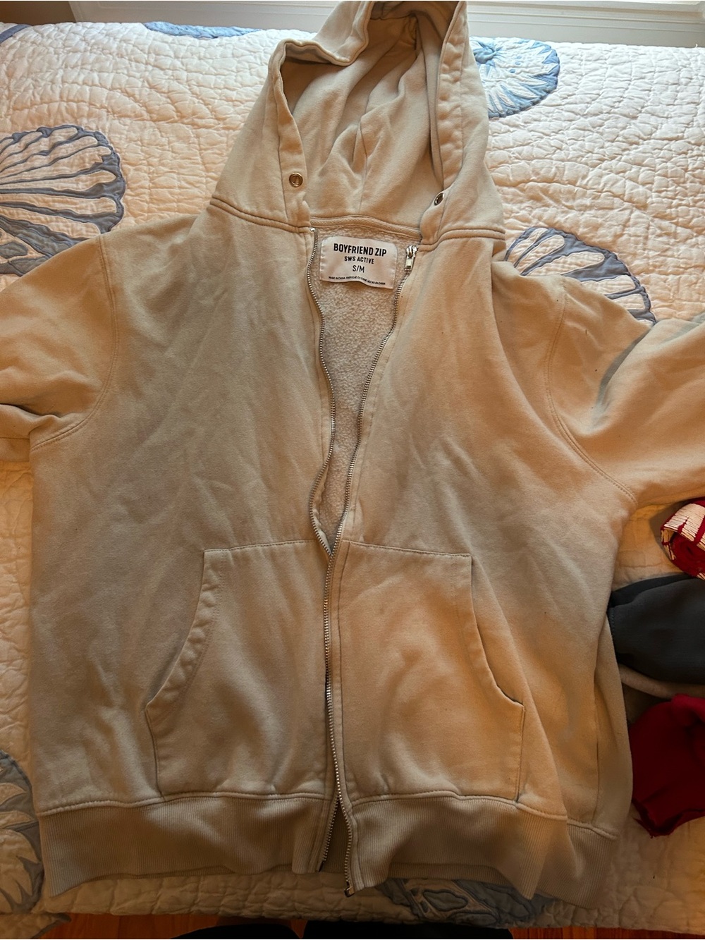 Cream colored zip up hoodie